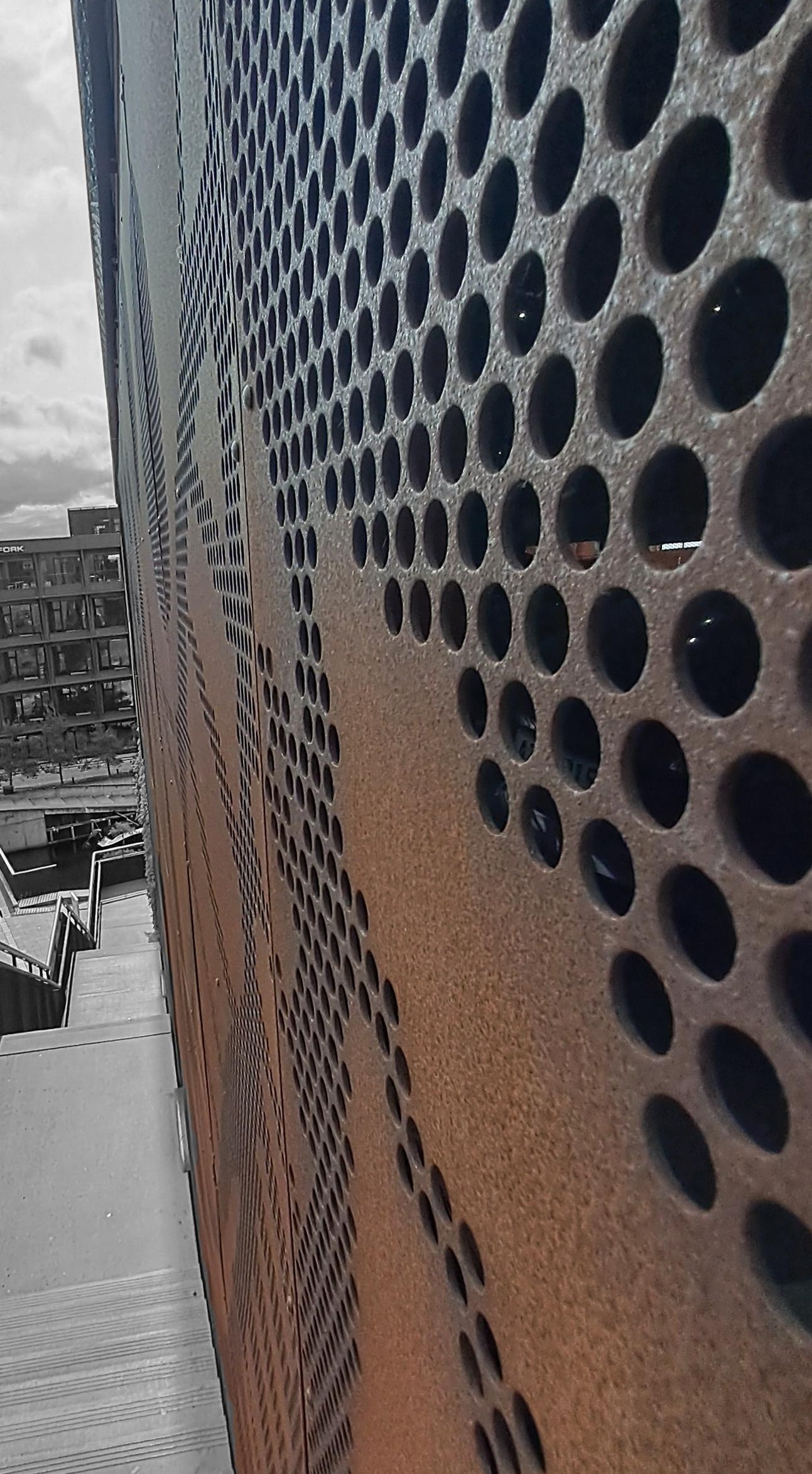 Corten steel perforated panel harbour view Slovenia