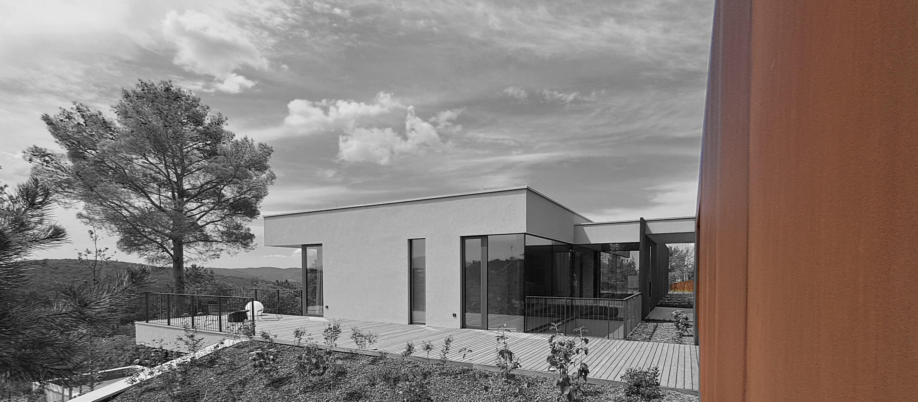Corten steel villa terrace deck pine forest Slovenia